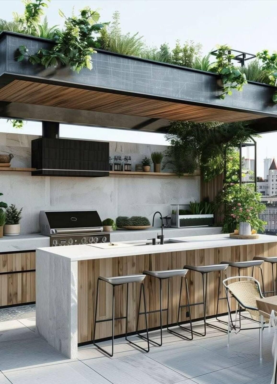 Outdoor kitchen with green roof pergola